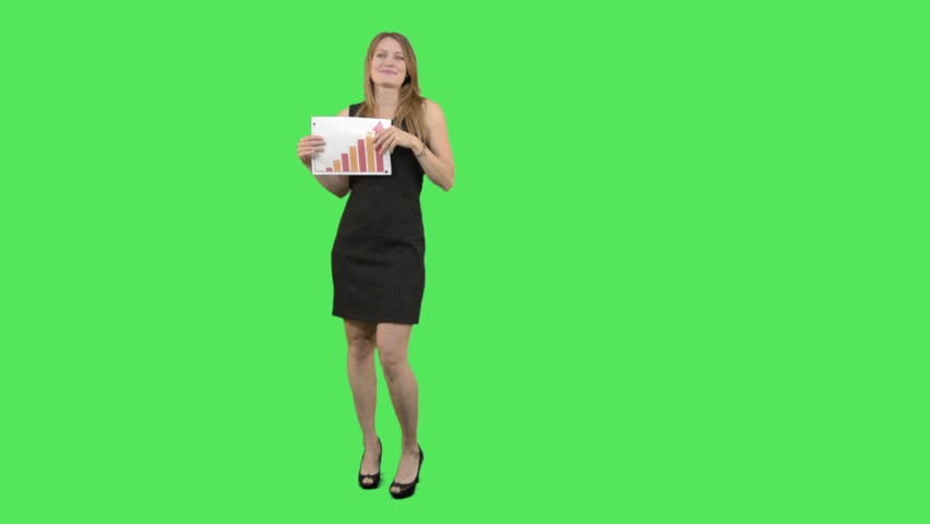 Business female holding up graphs  