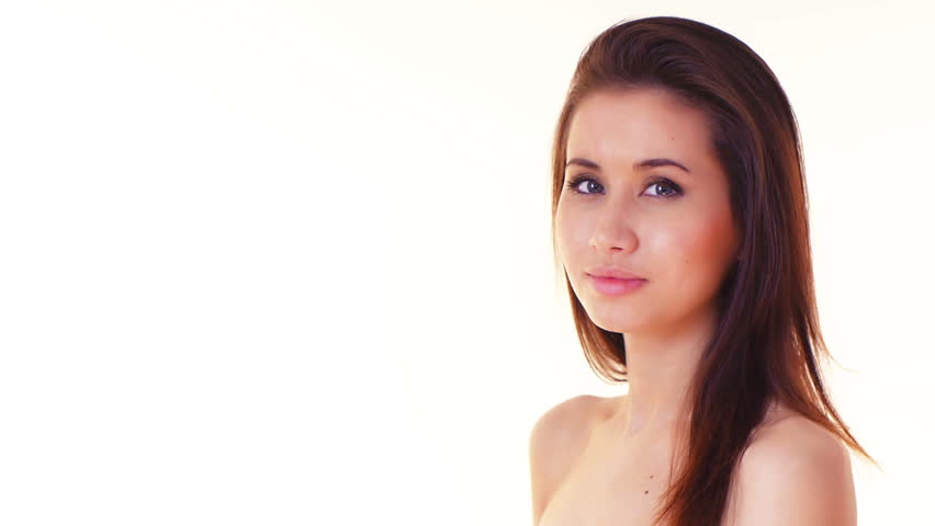 young woman with naked shoulders drink water, over white background