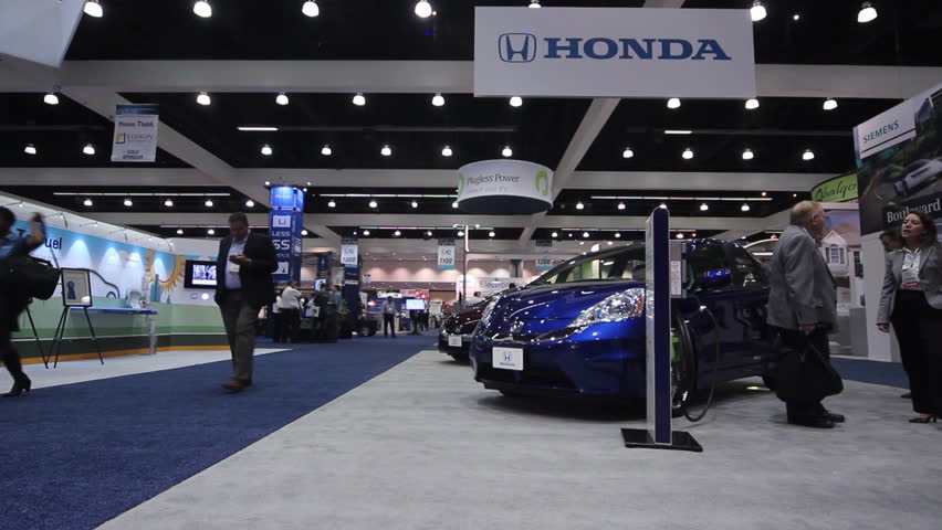 LOS ANGELES - MAY 6: A Prius Plug-in Hybrid Electric Car fast charges at the 26th Electric Vehicle Symposium on May 6, 2012 in Los Angeles, California. Test drives were made available to the pubic at the event.