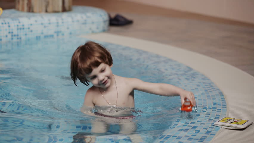 Slow Motion Of A Little Girl With Snorkeling Mask On Playfully