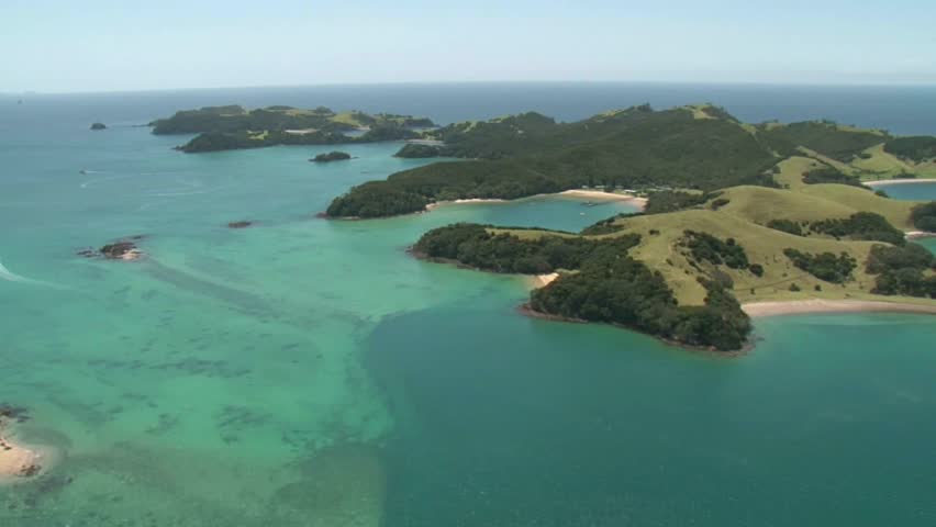 Urupukapuka Island, Bay of Islands, New Zealand. Scenic flight over the Bay of Islands and Urupukapuka Island in the foreground. 

