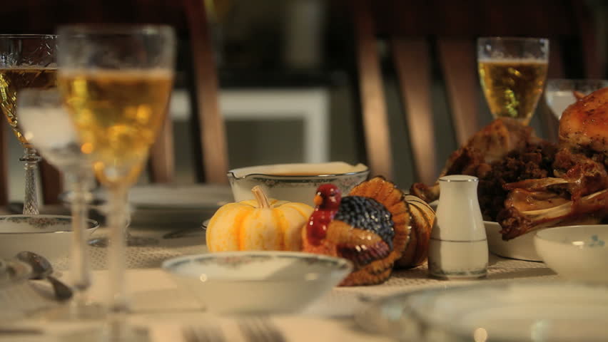 Camera panning left to right on a Thanksgiving dinner