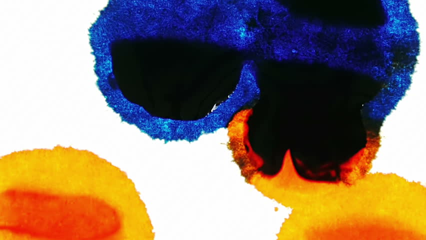 Ink Stains Merging and Expanding (HD). Blue and Orange Ink Expands over time lapse on a white fiber surface. 