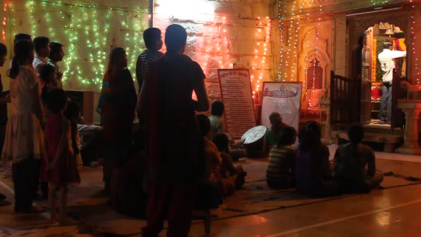 JAISALMER - SEPTEMBER 10: Hindu devotees pray at the temple during religious ceremony, September 10, 2011 in Jaisalmer, Rajasthan, India Hinduism is a religious tradition of India.