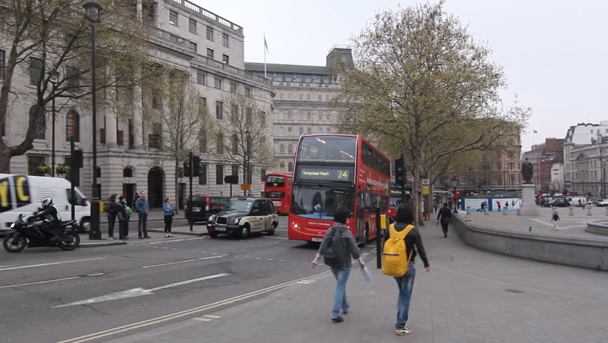 LONDON, UK APRIL 4th: Hybrid bus goes by, London on April 4th, 2012. Using a combination of diesel and electric power, green buses are a part of the Mayor of Londonâs scheme to reduce emissions.