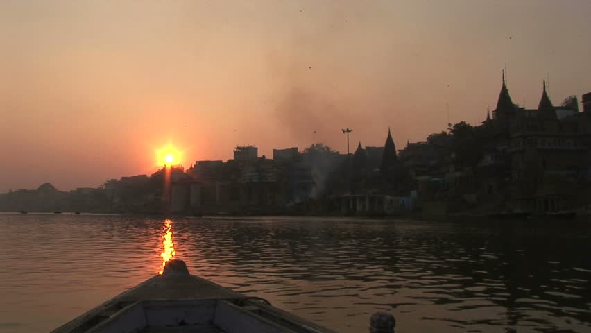 setting sun over Varanasi and Ganges river and Burning ghat version. Veranasi, India