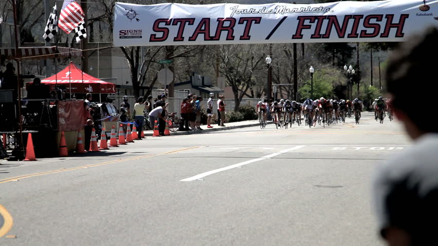 California - Circa 2009: A bike race in 2009. The winner crossing finish line in California.