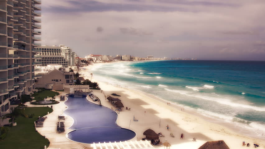 timelapse of the bay of hotels stretching along the coast in cancun, mexico