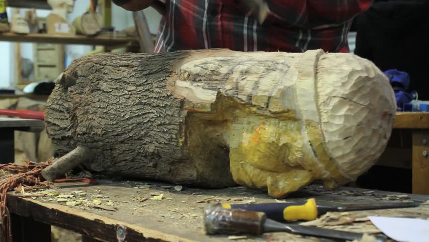 Wood carving an Indian figure