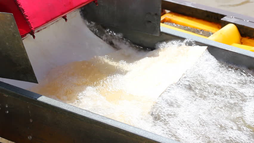 Suction dredge mining placer gold deposits. Operating in the Ecuadorian Amazon.