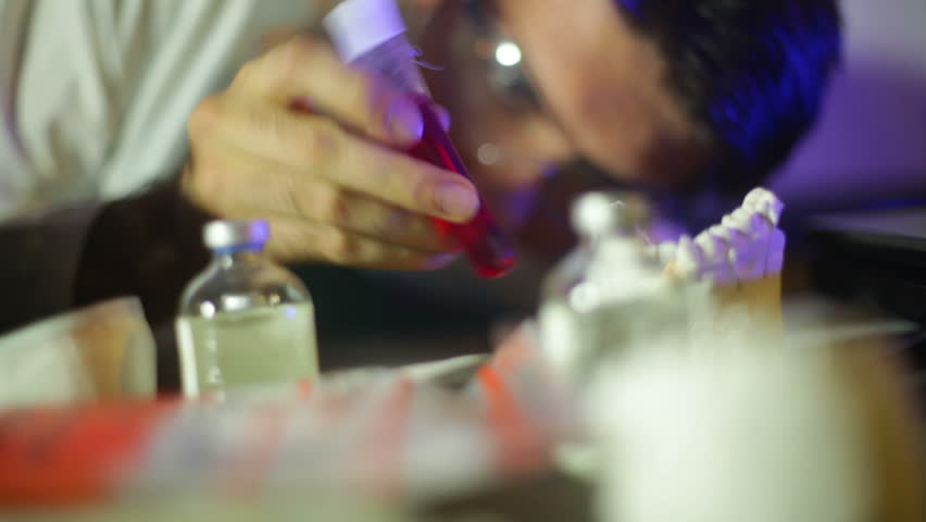 Scientist looking at a blood test