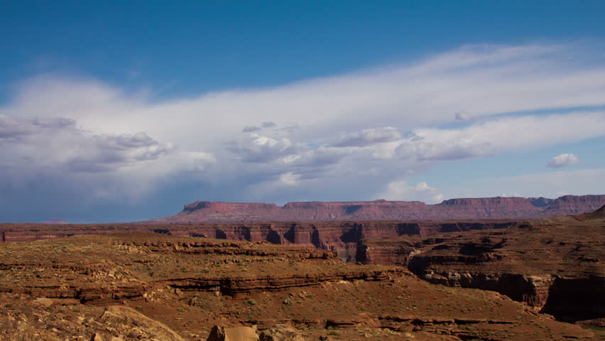 A timelapse of clouds over a stark southwest American landscape. Near Glen Canyon, Utah.