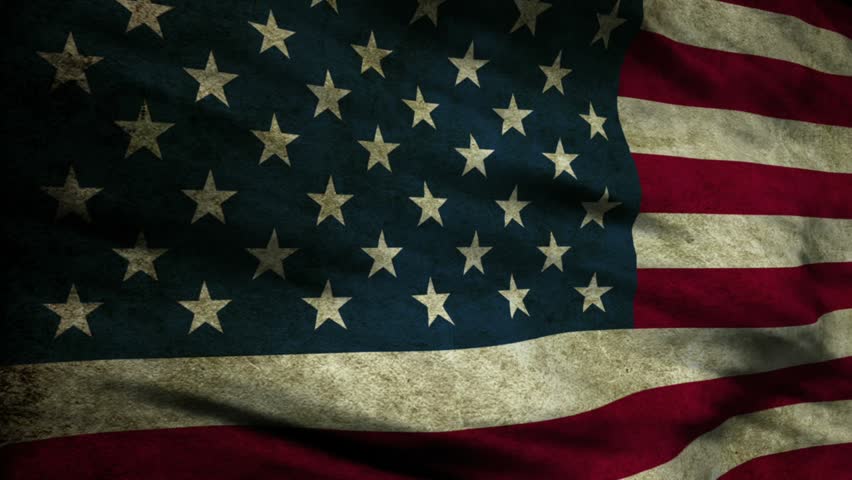 American Flag 0106 - A grungy American flag waves in the breeze.