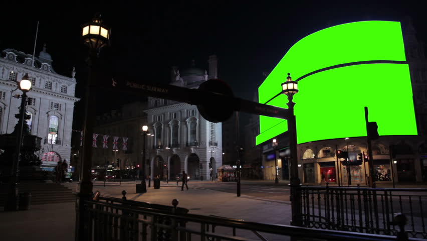 Piccadilly Circus at night WS with green screens