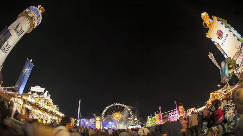 MUNICH - SEP 23: A timelapse of the Oktoberfest in fisheye view with the big ferry wheel in the center on September 23, 2011 in Munich, Germany.