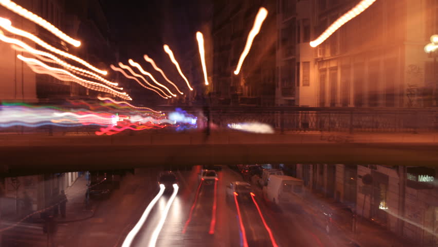 timelapse at night of a road and bridge in marseille, france