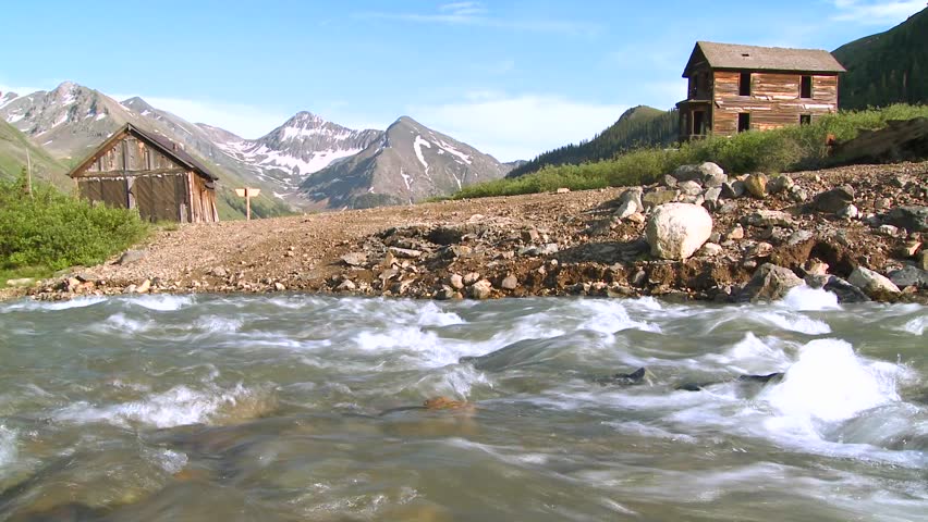 A river next to a ghost town