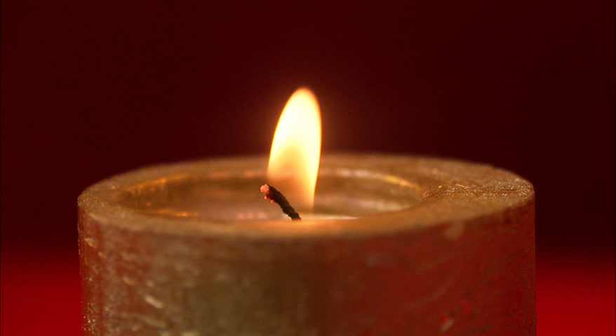 A candle and a Christmas present