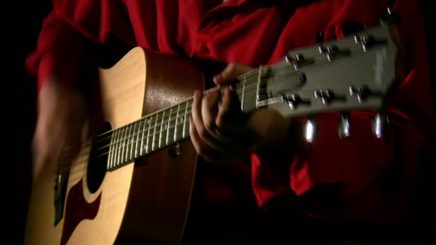 play on guitar in dark. 