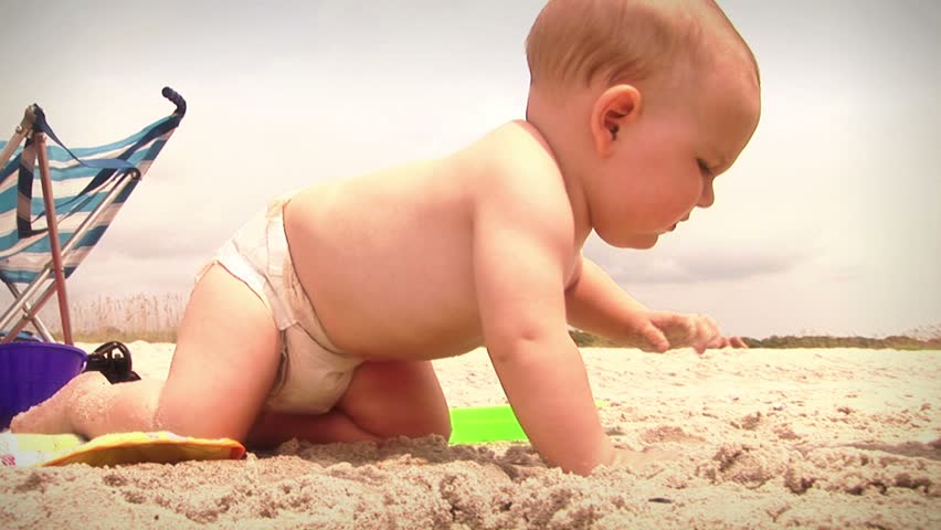 Baby at the Beach Series: Playing and Exploring. See my portfolio for more.