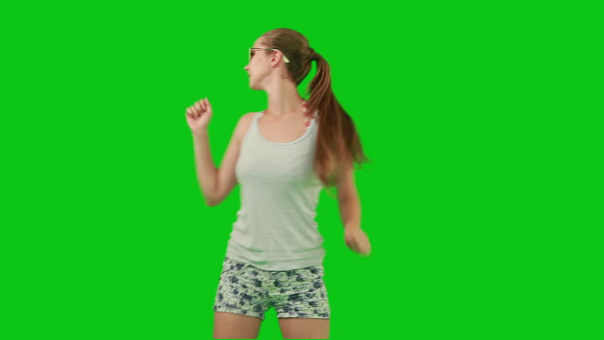Summer girl in sunglasses dancing