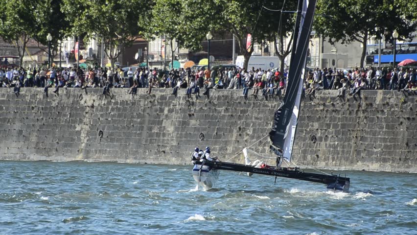 PORTO, PORTUGAL - JULY 7: SAP Extreme Sailing Team compete in the Extreme Sailing Series boat race on July 7, 2012 in Porto, Portugal.