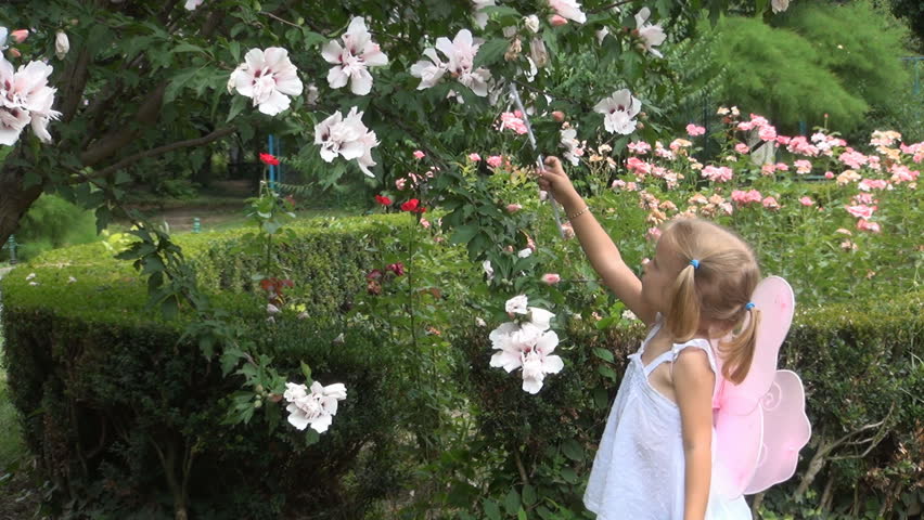 Child Playing with her Fairy Wand, Child Pretending to Be A Fairy Flowers