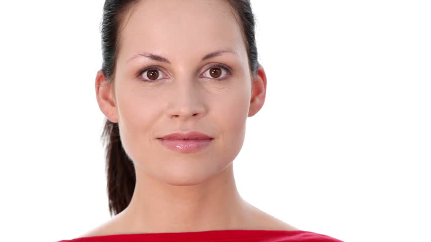 Beautiful woman showing her tongue. Over white background.