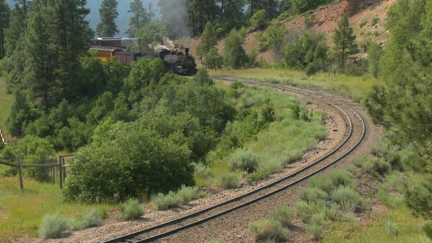 COLORADO - CIRCA 2010 - A Durango & Silverton Narrow Gauge Railroad steam train rounds a curve in the Rocky Mountains in rural Colorado.