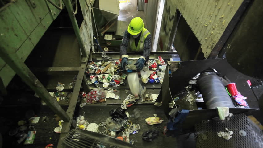 VIRGINIA - CIRCA 2008 - Workers sort trash at an FCR Recycling facility.