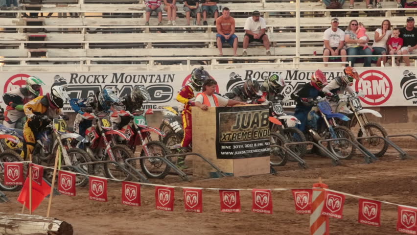 NEPHI, JUAB, UTAH 30 JUN 2012: Economic boost to rural community in annual race.  Extreme motorcycle race start. Juab County extreme enduro. Hard riding and dangerous motor vehicle event.