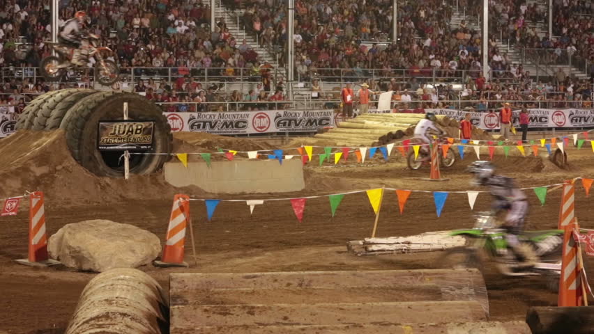 NEPHI, JUAB, UTAH 30 JUN 2012: Economic boost to rural community in annual race.  Extreme motorcycle race finish winner. Juab County extreme enduro. Hard riding and dangerous motor vehicle event.