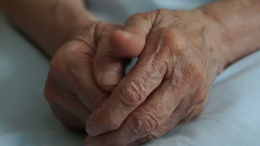 Senior woman with wrinkled hands.