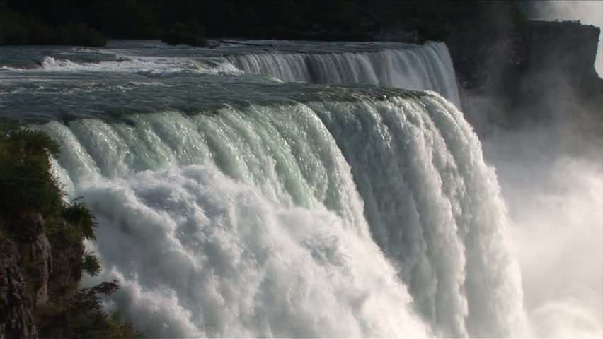 The powerful falls of Niagara majestically flow off and amaze. Truly a natural wonder of the planet Earth