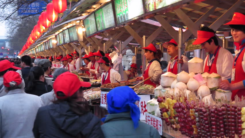 BEIJING, CHINA - CIRCA MAY 2011: Wangfujing Street, Snack Street Market selling traditional food