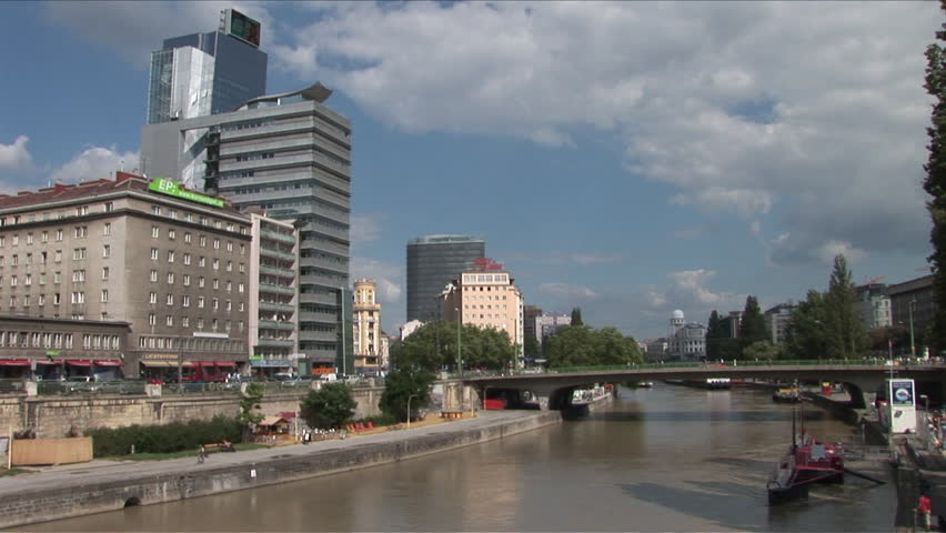 Vienna, Austria - CIRCA June, 2006: View of the Donaukanal waterway next to some buildings during the day