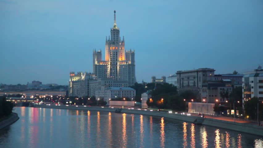 Skyscraper of Stalin era located on Kotelnicheskaya quay with illumination at night in Moscow