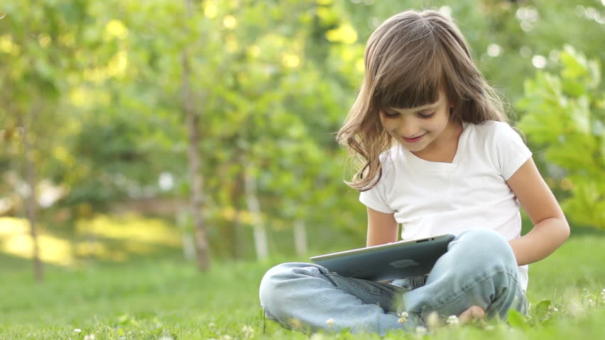 Girl with a Tablet PC. Thumbs up. Ok
