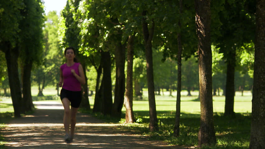 Woman running in a park