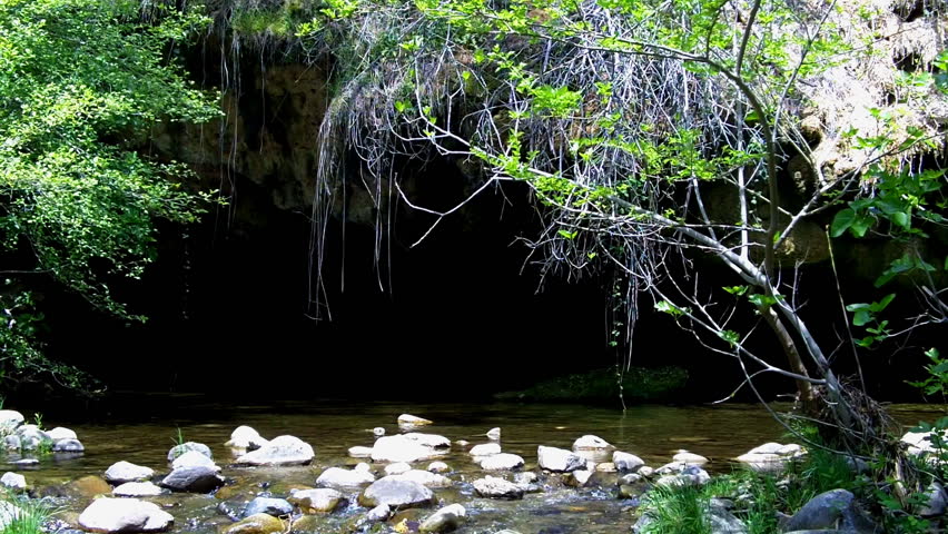The opening to a cave formed by an underground river in the Sierra Nevada Mountain foothills near Sonora, CA. 