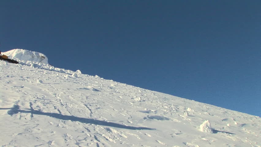 Male skier back flip off jump