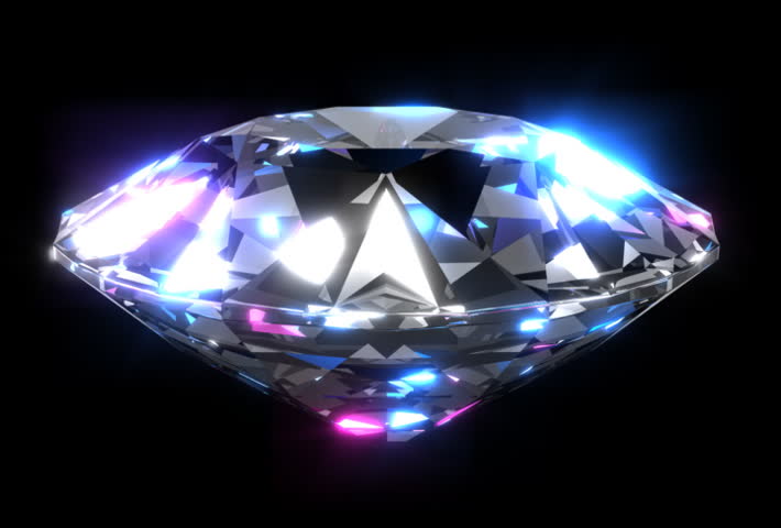 Large diamond revolving and catching the light with colorful sparkles. Loops.