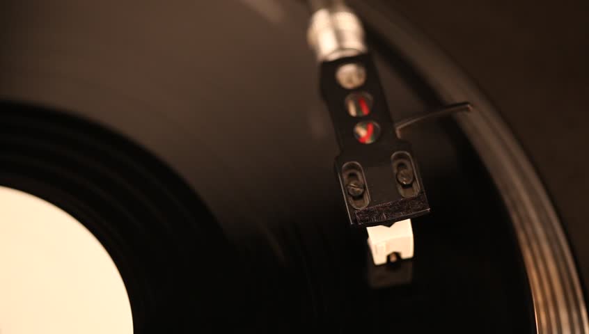 Dj needle on spinning  turntable, video