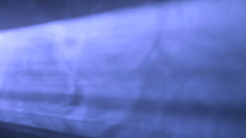Light beams from movie projector