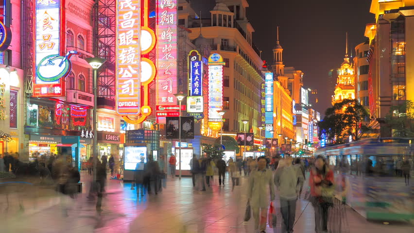 SHANGHAI, CHINA - CIRCA MAY 2012: Time lapse of extremely busy Nanjing Road, pedestrian mall circa May 2012 in Shanghai, China.