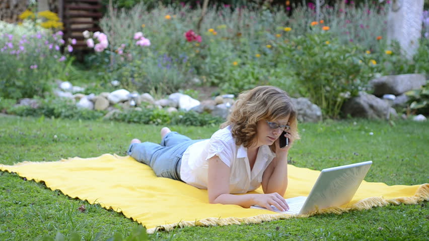 girl lies on a meadow