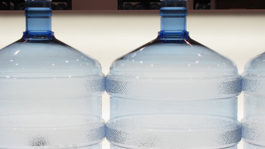 Bottled water factory. Production line. Time lapse, loopable.