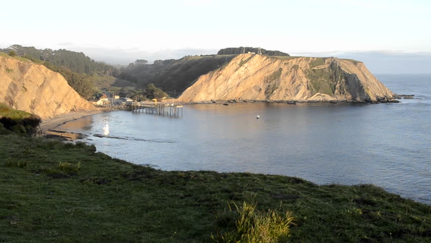 POINT ARENA, CALIFORNIA-CIRCA 2011-Sunset on Arena Cove from the Cypress Abbey County property at Point Arena, California.