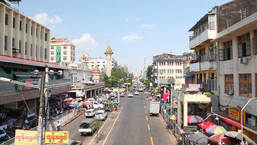YANGON, MYANMAR - APRIL 28: Yangon street activity on April 28, 2012 in Yangon. Yangon is the capital city of Myanmar.