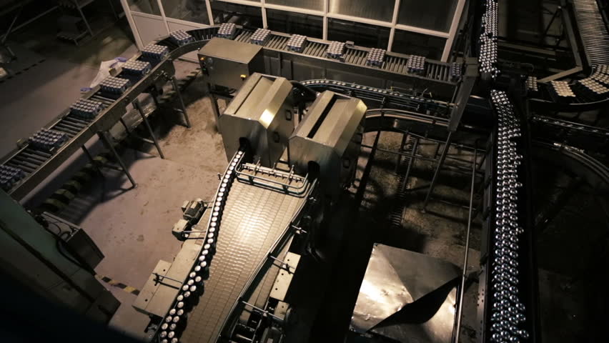 Conveyor for the production of drinks in aluminum cans
